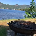 Деревянный коттедж Nisser Hyttegrend Og